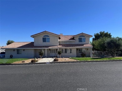Beautifully maintained and cared for 5 bedroom 3 bath home in on Spring Valley Lake Country Club in California - for sale on GolfHomes.com, golf home, golf lot