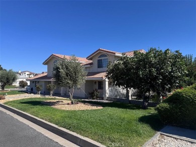 Beautifully maintained and cared for 5 bedroom 3 bath home in on Spring Valley Lake Country Club in California - for sale on GolfHomes.com, golf home, golf lot