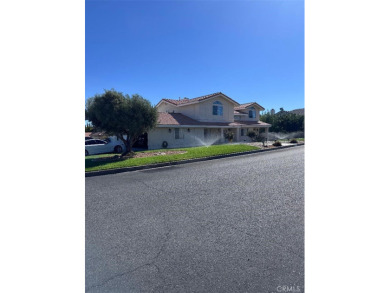 Beautifully maintained and cared for 5 bedroom 3 bath home in on Spring Valley Lake Country Club in California - for sale on GolfHomes.com, golf home, golf lot