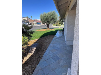 Beautifully maintained and cared for 5 bedroom 3 bath home in on Spring Valley Lake Country Club in California - for sale on GolfHomes.com, golf home, golf lot