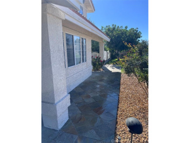 Beautifully maintained and cared for 5 bedroom 3 bath home in on Spring Valley Lake Country Club in California - for sale on GolfHomes.com, golf home, golf lot