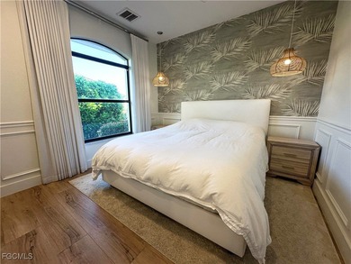 Elegant Home in the Prestigious Gated Community of Spanish Wells on Spanish Wells Golf and Country Club in Florida - for sale on GolfHomes.com, golf home, golf lot