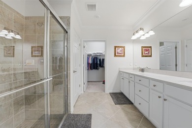 Discover elevated maintenance free Florida living in this on Sarasota National Golf Club in Florida - for sale on GolfHomes.com, golf home, golf lot