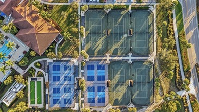 Discover elevated maintenance free Florida living in this on Sarasota National Golf Club in Florida - for sale on GolfHomes.com, golf home, golf lot