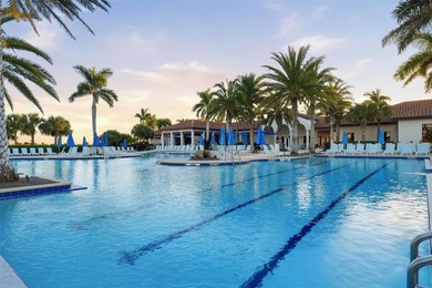 Discover elevated maintenance free Florida living in this on Sarasota National Golf Club in Florida - for sale on GolfHomes.com, golf home, golf lot