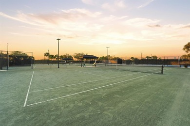 Discover elevated maintenance free Florida living in this on Sarasota National Golf Club in Florida - for sale on GolfHomes.com, golf home, golf lot