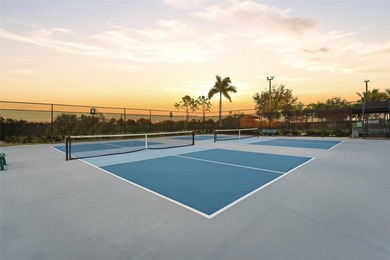 Discover elevated maintenance free Florida living in this on Sarasota National Golf Club in Florida - for sale on GolfHomes.com, golf home, golf lot