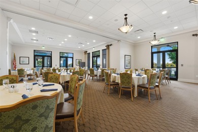 Discover elevated maintenance free Florida living in this on Sarasota National Golf Club in Florida - for sale on GolfHomes.com, golf home, golf lot