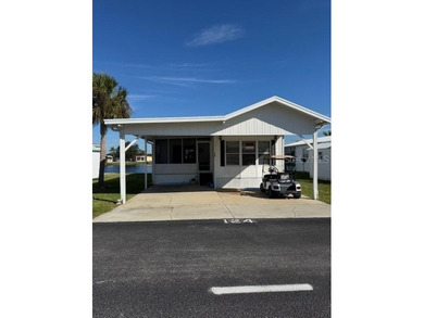 Laid back Florida living at it's finest Blue Cypress Golf and RV on Blue Cypress Golf and RV Resort in Florida - for sale on GolfHomes.com, golf home, golf lot