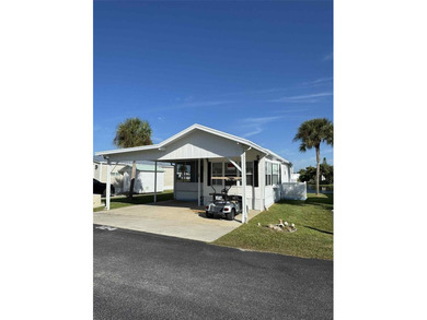 Laid back Florida living at it's finest Blue Cypress Golf and RV on Blue Cypress Golf and RV Resort in Florida - for sale on GolfHomes.com, golf home, golf lot