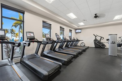 Discover elevated maintenance free Florida living in this on Sarasota National Golf Club in Florida - for sale on GolfHomes.com, golf home, golf lot