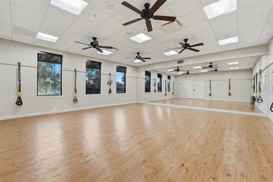 Discover elevated maintenance free Florida living in this on Sarasota National Golf Club in Florida - for sale on GolfHomes.com, golf home, golf lot