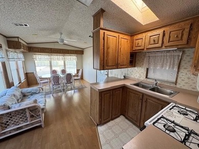 Laid back Florida living at it's finest Blue Cypress Golf and RV on Blue Cypress Golf and RV Resort in Florida - for sale on GolfHomes.com, golf home, golf lot