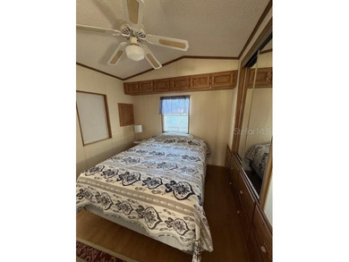 Laid back Florida living at it's finest Blue Cypress Golf and RV on Blue Cypress Golf and RV Resort in Florida - for sale on GolfHomes.com, golf home, golf lot