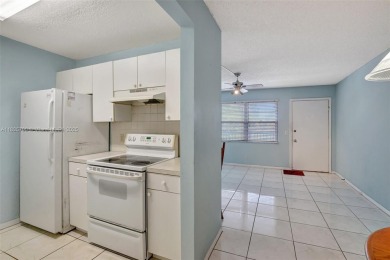 1 bedroom 1 bath, PopularA MODEL, 685 sq.ft. with a Great VIEW! on Flamingo Lakes Country Club in Florida - for sale on GolfHomes.com, golf home, golf lot