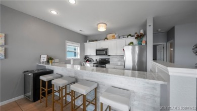 If you've been searching for a gorgeous turn-key condo with a on Seasons Ridge At Four Seasons in Missouri - for sale on GolfHomes.com, golf home, golf lot