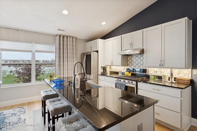 This 2 bed/2 bath home offers an open floor plan with energy on Eagle Eye Golf Club in Michigan - for sale on GolfHomes.com, golf home, golf lot