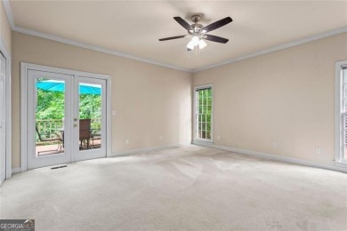 Easy Living in The Spinnakers of Windward! Downsize without on The Golf Club of Georgia in Georgia - for sale on GolfHomes.com, golf home, golf lot