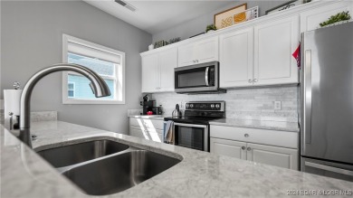 If you've been searching for a gorgeous turn-key condo with a on Seasons Ridge At Four Seasons in Missouri - for sale on GolfHomes.com, golf home, golf lot