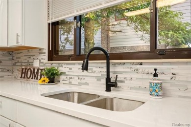 STUNNING DREAM HOME! Custom built for the family that loves to on Riverview Highlands Golf Club  in Michigan - for sale on GolfHomes.com, golf home, golf lot