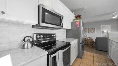 If you've been searching for a gorgeous turn-key condo with a on Seasons Ridge At Four Seasons in Missouri - for sale on GolfHomes.com, golf home, golf lot
