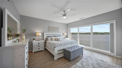 If you've been searching for a gorgeous turn-key condo with a on Seasons Ridge At Four Seasons in Missouri - for sale on GolfHomes.com, golf home, golf lot