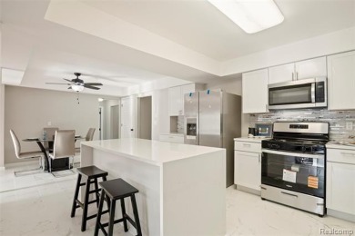 STUNNING DREAM HOME! Custom built for the family that loves to on Riverview Highlands Golf Club  in Michigan - for sale on GolfHomes.com, golf home, golf lot