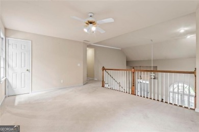 Easy Living in The Spinnakers of Windward! Downsize without on The Golf Club of Georgia in Georgia - for sale on GolfHomes.com, golf home, golf lot