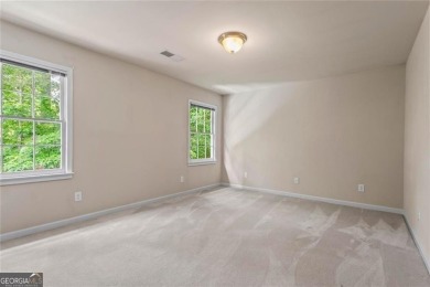 Easy Living in The Spinnakers of Windward! Downsize without on The Golf Club of Georgia in Georgia - for sale on GolfHomes.com, golf home, golf lot