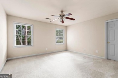 Easy Living in The Spinnakers of Windward! Downsize without on The Golf Club of Georgia in Georgia - for sale on GolfHomes.com, golf home, golf lot
