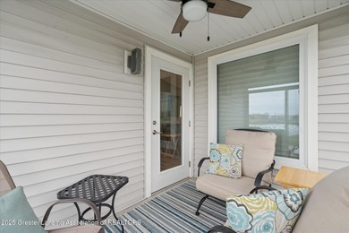 This 2 bed/2 bath home offers an open floor plan with energy on Eagle Eye Golf Club in Michigan - for sale on GolfHomes.com, golf home, golf lot