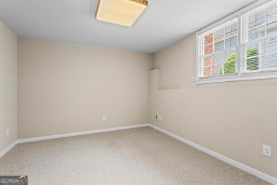 Easy Living in The Spinnakers of Windward! Downsize without on The Golf Club of Georgia in Georgia - for sale on GolfHomes.com, golf home, golf lot