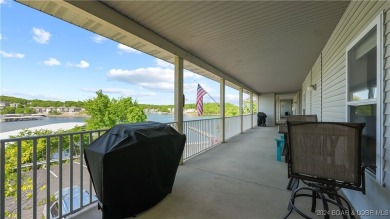 If you've been searching for a gorgeous turn-key condo with a on Seasons Ridge At Four Seasons in Missouri - for sale on GolfHomes.com, golf home, golf lot