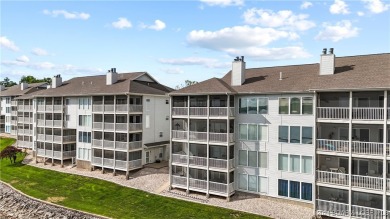 If you've been searching for a gorgeous turn-key condo with a on Seasons Ridge At Four Seasons in Missouri - for sale on GolfHomes.com, golf home, golf lot