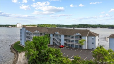 If you've been searching for a gorgeous turn-key condo with a on Seasons Ridge At Four Seasons in Missouri - for sale on GolfHomes.com, golf home, golf lot