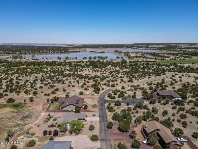 Beautiful tree filled (.51 acres) lot with both lake and golf on Silver Creek Golf Club in Arizona - for sale on GolfHomes.com, golf home, golf lot
