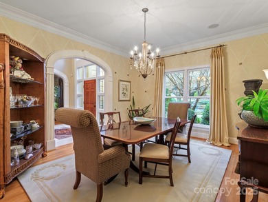 Exquisite Custom-built Estate, perfectly nestled in the on TPC at Piper Glen in North Carolina - for sale on GolfHomes.com, golf home, golf lot