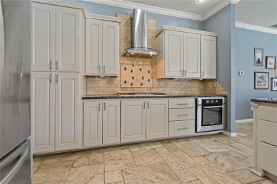 Under contract-accepting backup offers. One or more photo(s) has on Crescent Oaks Country Club in Florida - for sale on GolfHomes.com, golf home, golf lot