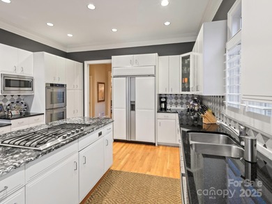 Exquisite Custom-built Estate, perfectly nestled in the on TPC at Piper Glen in North Carolina - for sale on GolfHomes.com, golf home, golf lot