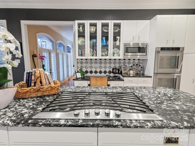 Exquisite Custom-built Estate, perfectly nestled in the on TPC at Piper Glen in North Carolina - for sale on GolfHomes.com, golf home, golf lot