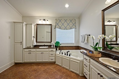 This beautifully updated spacious 4 bedroom, 3 bath home really on University Club in Louisiana - for sale on GolfHomes.com, golf home, golf lot