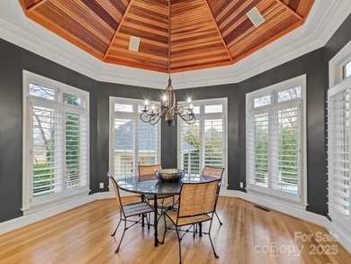 Exquisite Custom-built Estate, perfectly nestled in the on TPC at Piper Glen in North Carolina - for sale on GolfHomes.com, golf home, golf lot