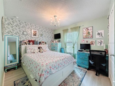 Welcome to 7149 Crested Orchid Drive - a beautifully maintained on Sherman Hills Golf Club in Florida - for sale on GolfHomes.com, golf home, golf lot