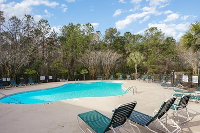 Two-bedroom two bath fully furnished second floor end unit in on Barefoot Resort and Golf Club  in South Carolina - for sale on GolfHomes.com, golf home, golf lot