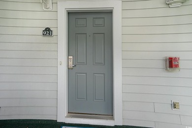 Two-bedroom two bath fully furnished second floor end unit in on Barefoot Resort and Golf Club  in South Carolina - for sale on GolfHomes.com, golf home, golf lot