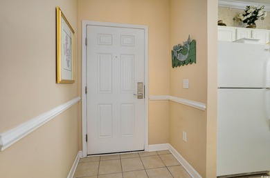 Two-bedroom two bath fully furnished second floor end unit in on Barefoot Resort and Golf Club  in South Carolina - for sale on GolfHomes.com, golf home, golf lot