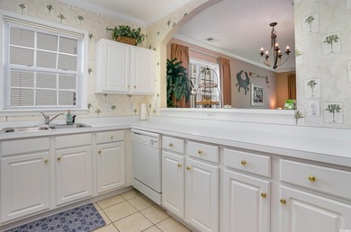 Two-bedroom two bath fully furnished second floor end unit in on Barefoot Resort and Golf Club  in South Carolina - for sale on GolfHomes.com, golf home, golf lot