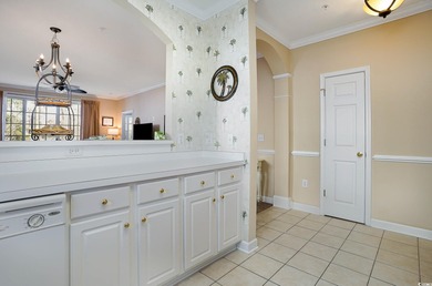 Two-bedroom two bath fully furnished second floor end unit in on Barefoot Resort and Golf Club  in South Carolina - for sale on GolfHomes.com, golf home, golf lot