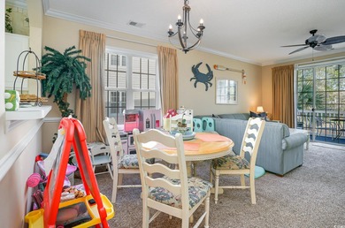 Two-bedroom two bath fully furnished second floor end unit in on Barefoot Resort and Golf Club  in South Carolina - for sale on GolfHomes.com, golf home, golf lot