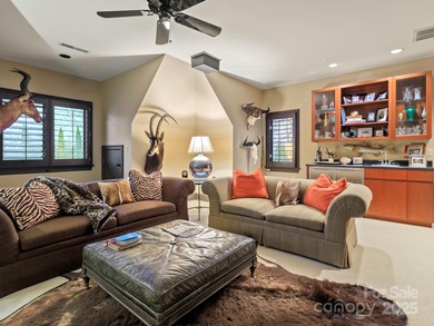 Exquisite Custom-built Estate, perfectly nestled in the on TPC at Piper Glen in North Carolina - for sale on GolfHomes.com, golf home, golf lot